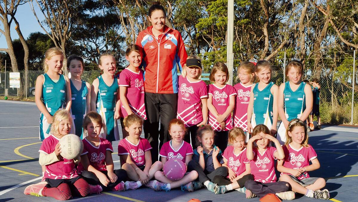 MERIMBULA: NSW Swifts star Susan Pratley was in Merimbula to share her training skills with some junior netballers last Thursday. Pictured with Susan are the NetSetGo! group for five to seven-year-olds.