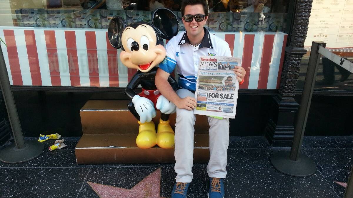 MERIMBULA: Pilot Ryan Campbell, of Merimbula, took a tour of Hollywood stopping to pose with Mickey Mouse.