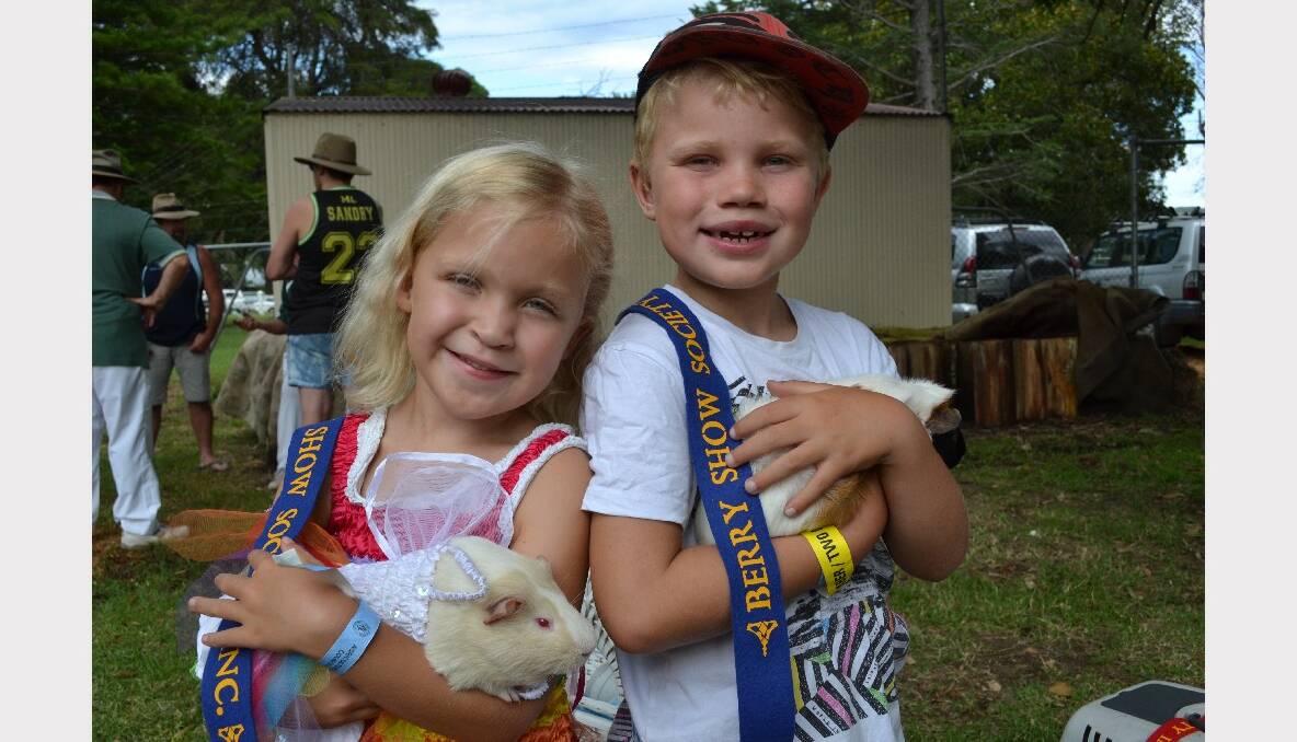 Georgia and Joel Philpott from Berry with their award-winning guinea pigs Milly and Markey at the Berry Show’s pet competition. 