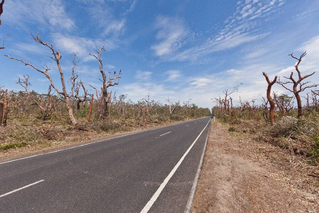 AFTER: Seven Mile Beach road, pictured at the same spot, before and after the weekend’s tornadoes. Photo courtesy of Red Berry Photography.