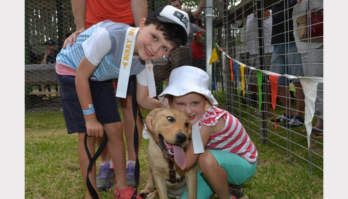 Thomas and Anna Duncan from Cambewarra with Blondie who placed third in the dog with the waggiest tail contest at Berry Show.