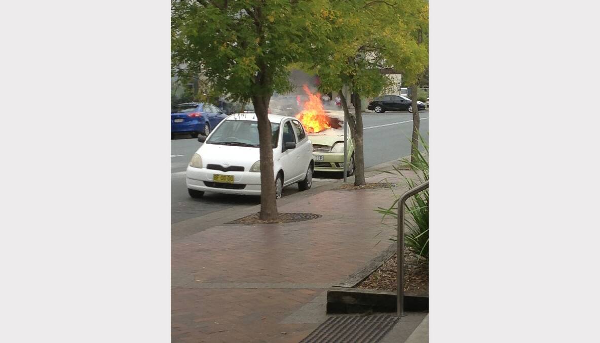 A Ford Festiva caught fire in Kinghorne Street at about 3.30pm on Tuesday. PHOTO BY MILO.