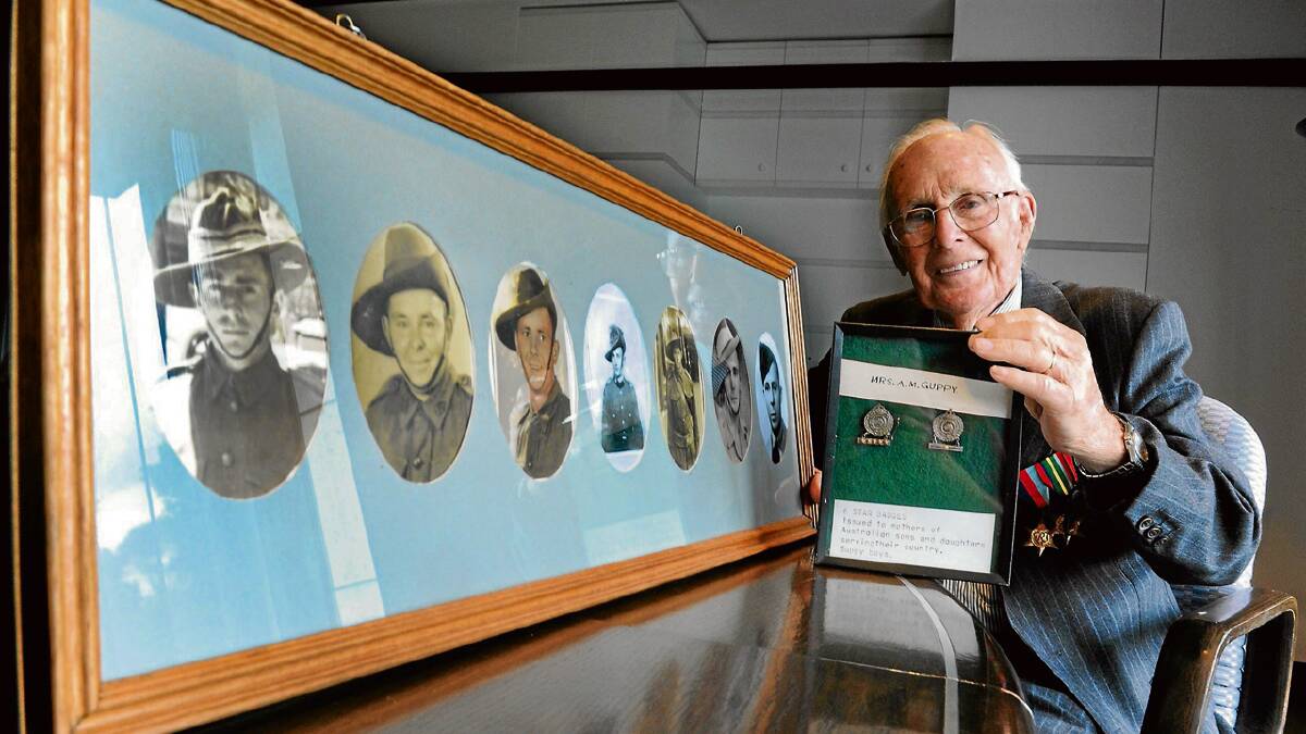 BADGES OF HONOUR: The late Bruce Guppy at the Australian War Memorial when he donated his mother’s medallions. Photo: GRAHAM TIDY