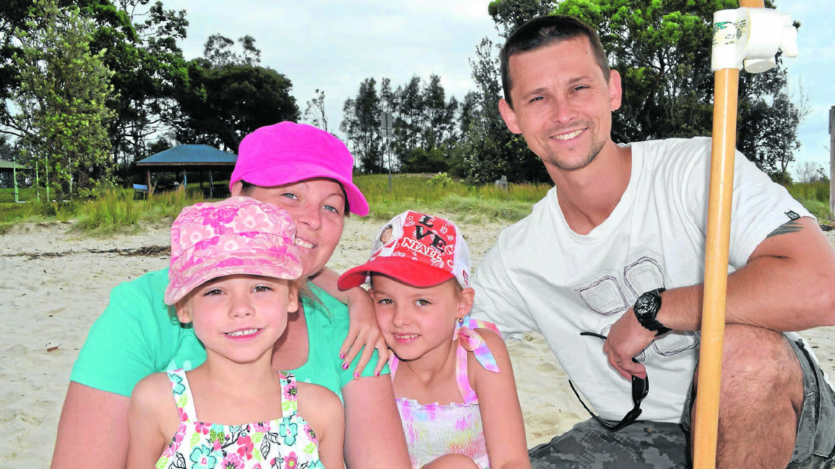 FAMILY FIRST: Rebecca and Steve Klarich with their daughters Gwen and Gabby from Campbelltown would consider moving to the Shoalhaven if the job opportunities were here.