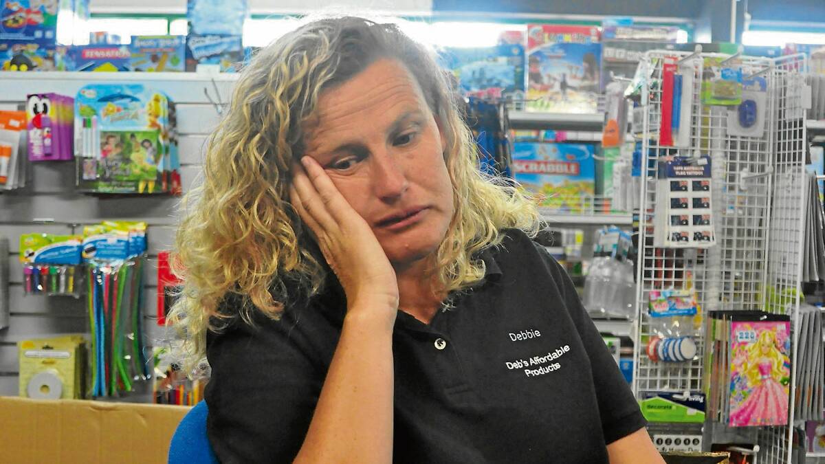 HIT HARD: Debbie Abello from Deb’s Affordable Products in the Bomaderry Plaza hopes her luck will improve after thieves stole two weeks’ takings. 