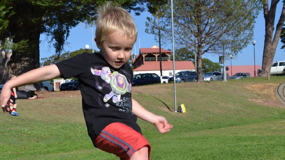 PUNTING POWER: Riley Gardiner from Worrigee puts his boot to the ball at the Auskick clinic in Nowra last year.