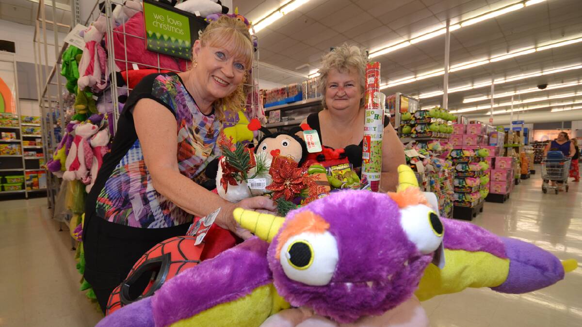 CHRISTMAS CHEER: Cheryl Thornton and Lynne French from the Ritchie Street Tenant Support Group buy up big to give gifts to the Children’s Ward at Shoalhaven Hospital.