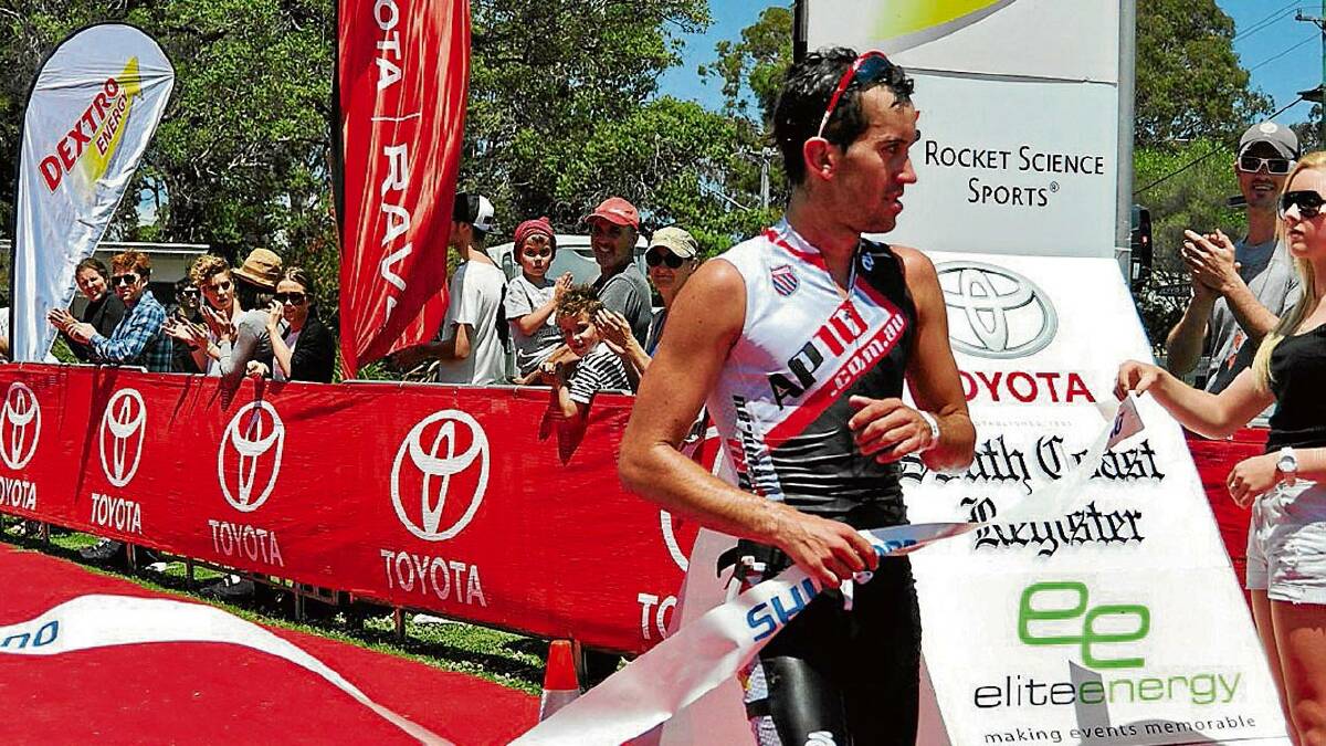 BACK IN THE SWING OF THINGS: Wollongong David Mainwaring claims victory in the Olympic distance triathlon, his first event for seven months.