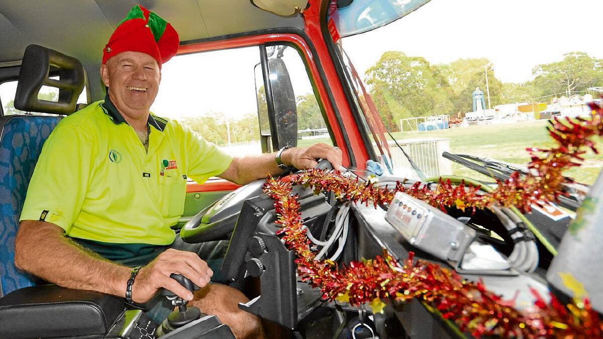 CLEAN MACHINE: Many of our local garbage collectors like St Georges Basin’s Jim Sach had to work over the silly season, but that didn’t stop them from getting into the spirit of things. 