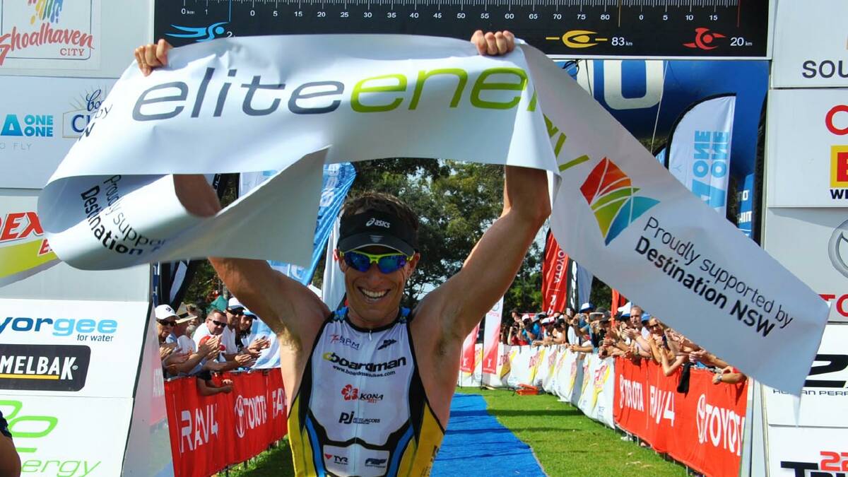 FIRST HOME: Current Hawaii ironman champion Pete Jacobs crosses the line to claim victory in last year’s race.