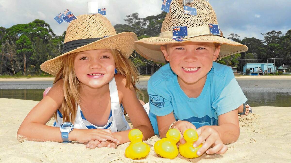PROUD LITTLE AUSSIES: Siblings Jaxon and Ava O’Brien get ready for Saturday’s duck derby and Aussie hat competition at Moona Moona Creek reserve.
