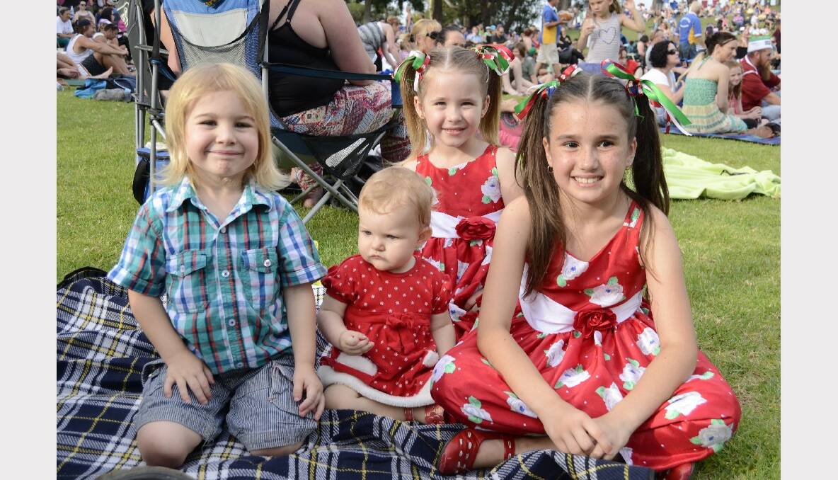 KIDS NIGHT: Pacey and Journey Ebzery with Pheonix Nolan and Cherry Seymour all from Nowra enjoying a Sunday night out at Carols by Candlelight in Harry Sawkins Park.
