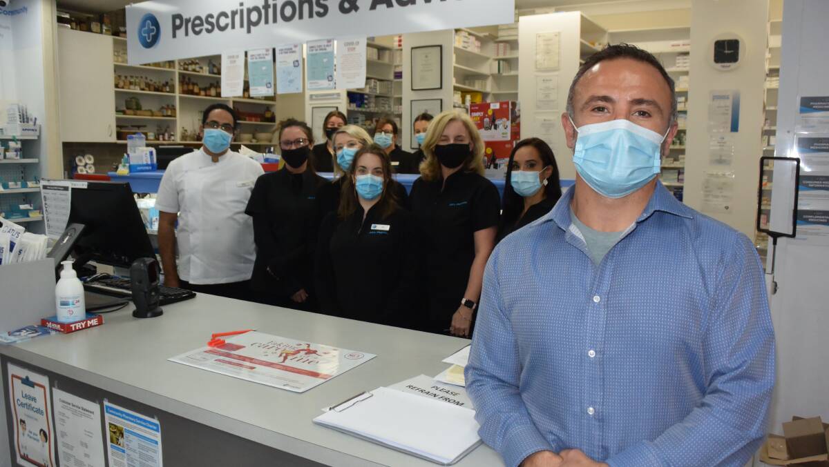 Nuri Atli with his team from Atli's Country Pharmacy in East Nowra.