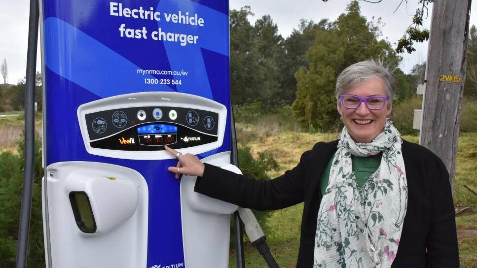 Shoalhaven Mayor Amanda Findley charging a new electric car at the NRMA fast charging station in Berry.