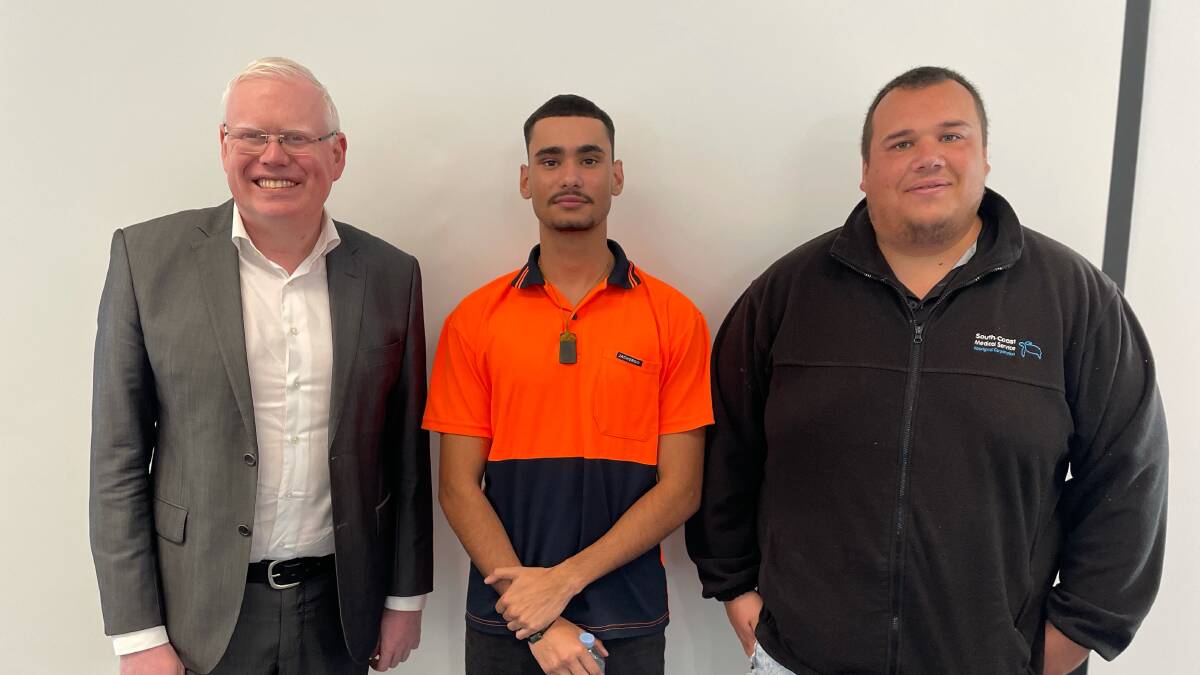 REDUCING RECIDIVISM: Pictured is Tyrone Walter standing between his caseworker Jordan Farrell, and the Minister for Families, Communities and Disability Services Gareth Ward.