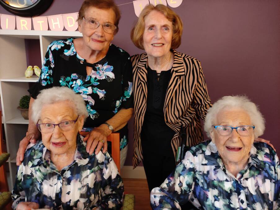 HAPPY BIRTHDAY: 102-year-old identical twins Concie Marshall and Leila Moag with their daughters, Rhonda (left) and Barbara.
