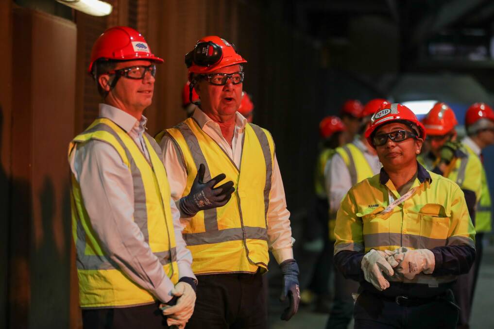 Green steel: Minister Angus Taylor with Bluescope CEO Mark Vassella and Furnace Operations manager Kamini Wijekulasuria in March. Picture: Adam McLean