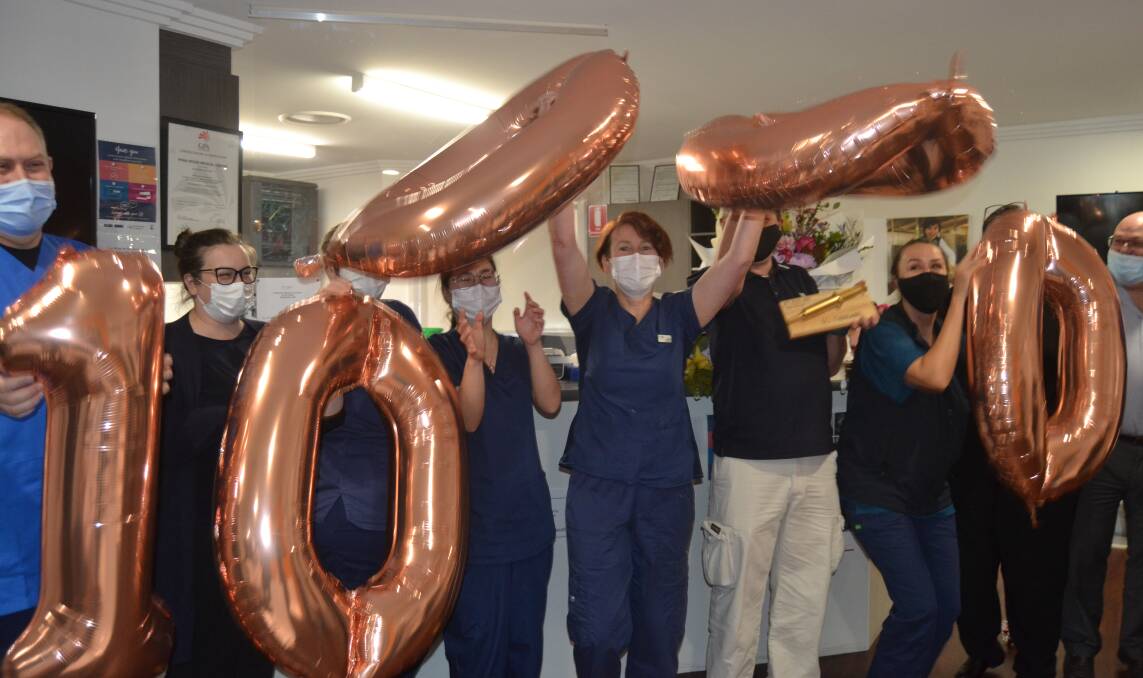 CELEBRATIONS: Nursing staff at the Worrigee Medical Centre jump for joy as Vincentia's Tim Foley received the 10,000th dose of the COVID-19 vaccine on Thursday, July 29. Image: Grace Crivellaro