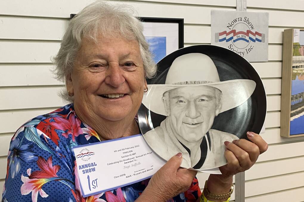 Faye Suffolk with her porcelain portrait of Terry 'Buster' Bennett that won top prize in the Nowra Show and at the Sydney Royal Easter Show. 