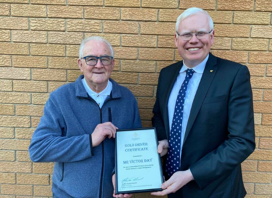 CELEBRATED: Kiama MP Gareth Ward presented Mr Day with a Gold Driver Certificate in honour of his 70 years clean driving record over the weekend. 