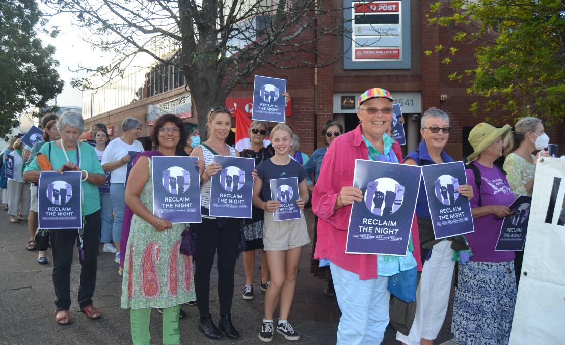 SEA OF PURPLE: A crowd of around 100 marched from the Nowra Showground down Junction Street to 'Relcaim the Night' and call for an end to violence against women on Friday, March 4. Image: Grace Crivellaro.