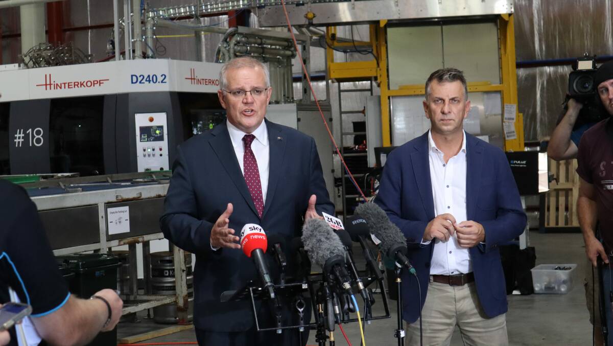 PLEDGE: On the first day of the federal election campaign, Prime Minister Scott Morrison visited Culburra Beach and pledged a $40 million boost for the Shoalhaven road network alongside Liberal candidate Andrew Constance. Picture: Jorja McDonnell.