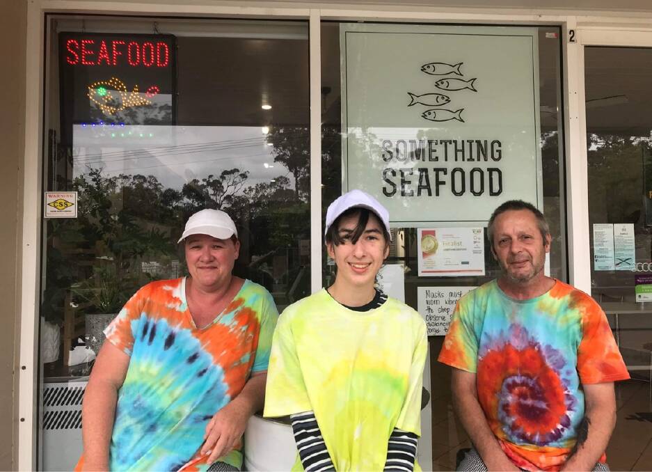 WINNERS: Owner of Something Seafood in Callala Bay, Jamie Parkinson (right), was thrilled to have taken out top gong for best fish and chips in NSW. Image: supplied.
