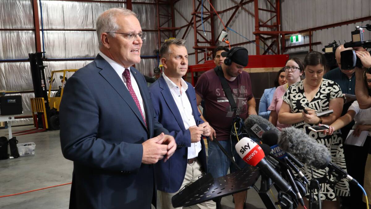 CAMPAIGN: On the first day of the 2022 federal election campaign, Prime Minister Scott Morrison visited Culburra Beach, joined by Liberal Gilmore candidate Andrew Constance. Image: Jorja McDonnell.