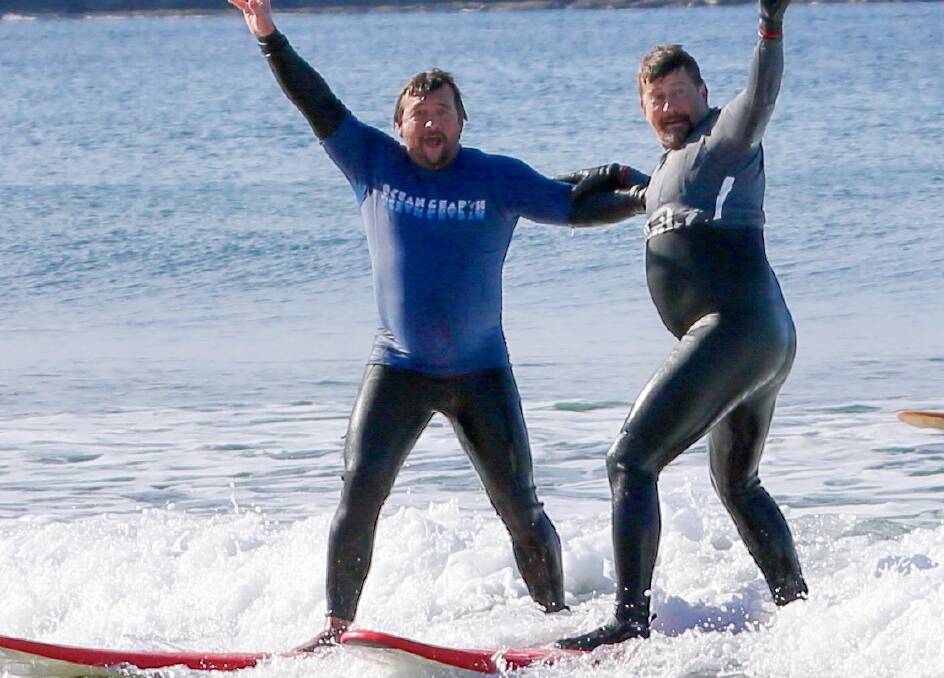 Greg Williams (left) and Greg Symmans are members of the Veteran Surf Project. Photo: Levi Cahill