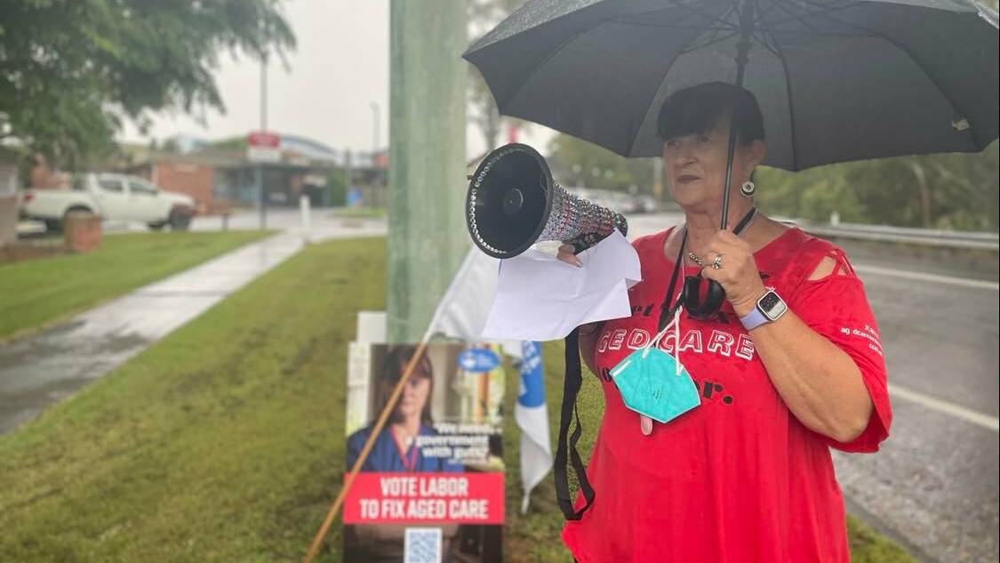 RALLY: Illawarra aged care nurse Sue Walton outside Shoalhaven hospital on Wednesday. She said staff are overworked, burnt out and underpaid. Picture: Grace Crivellaro.