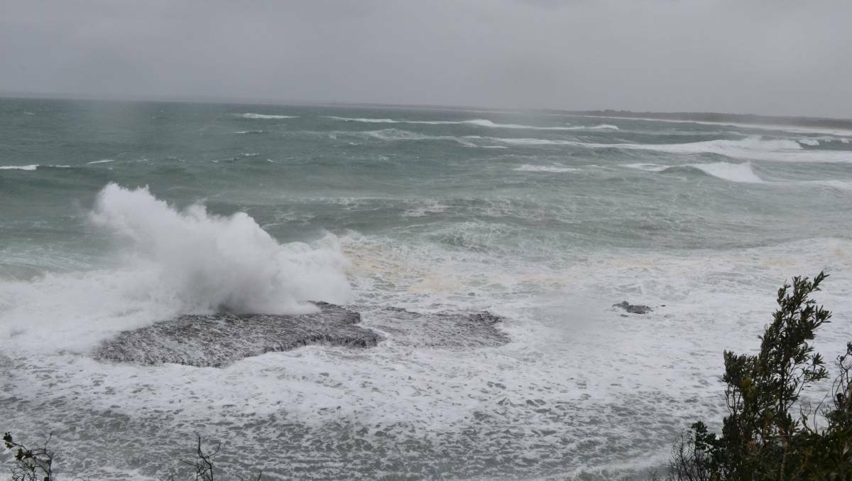 EXERCISE CAUTION: A Hazardous Surf Warning has been issued for the NSW coast in the wake of three to four metre swells. File image of large surf at Penguin Head headland at Culburra Beach.