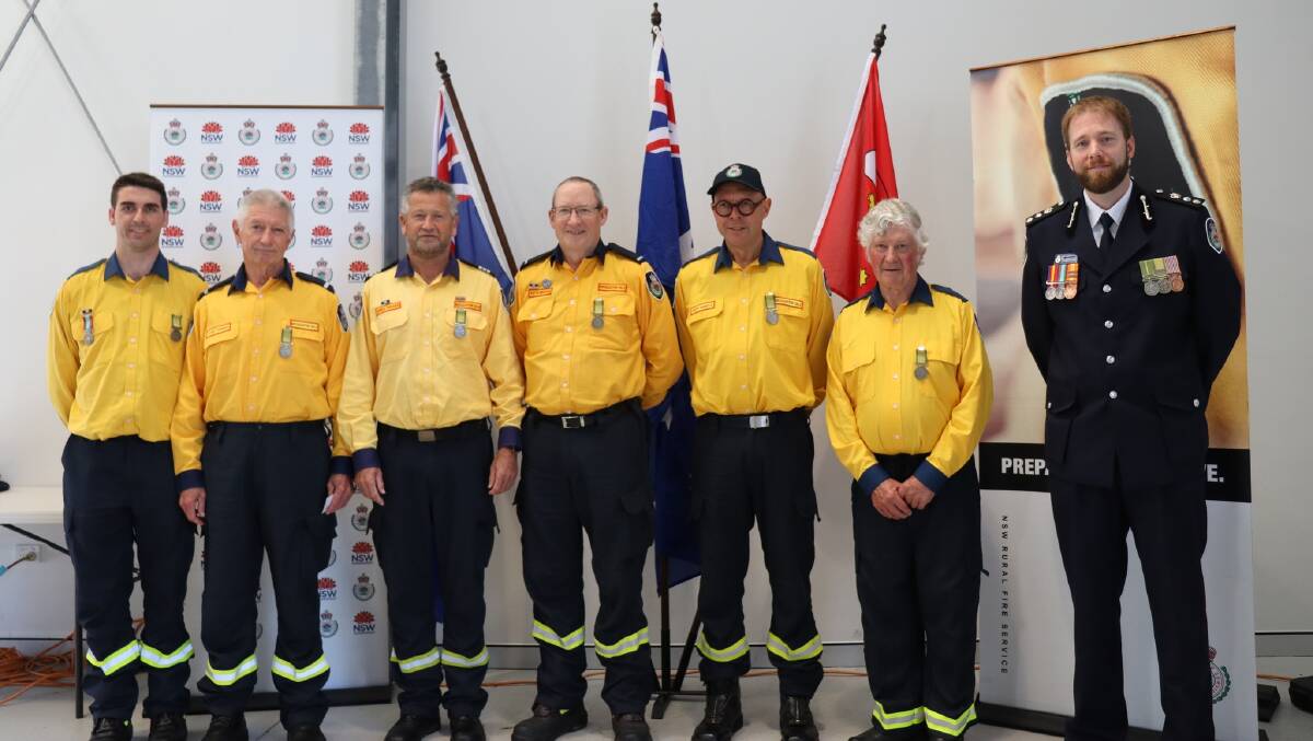 AWARDS: Members of the NSW RFS Shoalhaven district gathered at West Nowra Rural Fire Brigade station over the weekend, where more than 300 members received the National Emergency Medal (NEM).