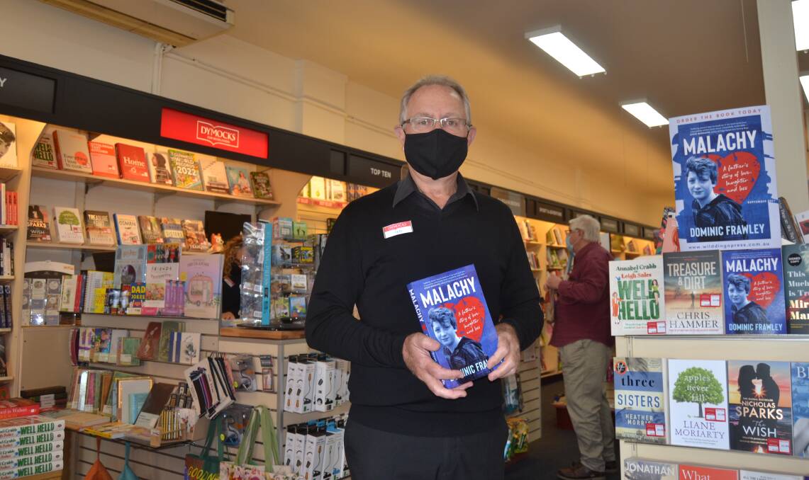 RETAIL OPEN: Owner of Dymocks in Nowra, Ted Downes, said Malachy by local doctor Dominic Frawley has been a popular pick during lockdown.
