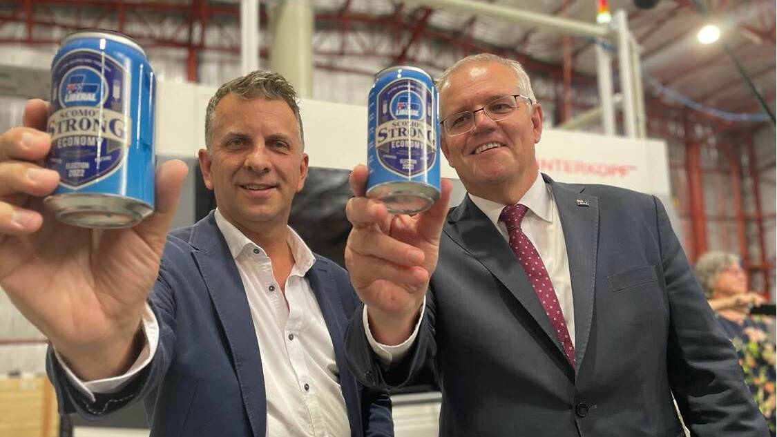 Gilmore Liberal candidate Andrew Constance and Prime Minister Scott Morrison at Culburra Beach business, East Coast Canning on Monday. Image: Grace Crivellaro.