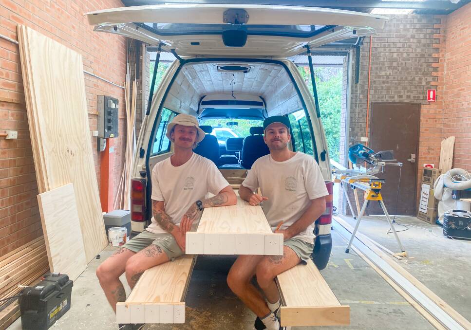 LIVING THE DREAM: Callum and Chris like to give each van a unique coastal feel. This van has been fitted with a table and chairs for a customer in Newcastle. 