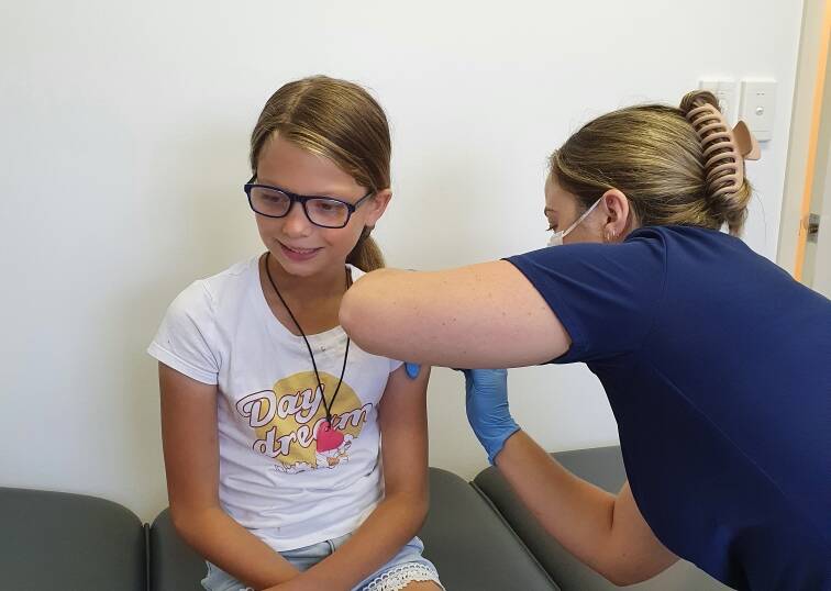 FIRST JAB: Greenwell Point's Destiny Bux, 10, rolled her sleeve up for her first COVID vaccine on Monday, January 10. Image: supplied.