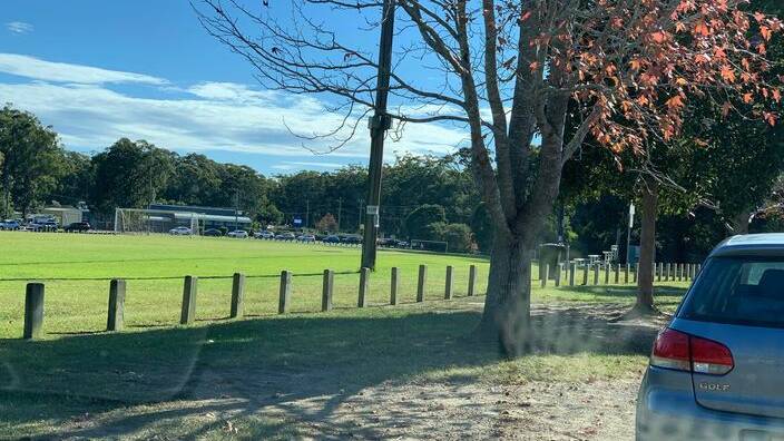 LINING UP: Cars are stretching around the Huskisson Sports Ground as they wait for over an hour to get their COVID test at the pop-up clinic. Image: Kerrie Kelly.