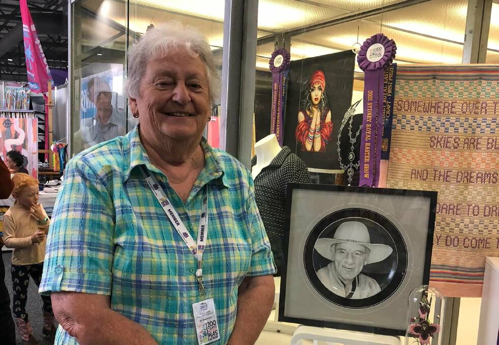 Faye Suffolk with her winning entry, a porcelain portrait of Terry Bennett at the Sydney Royal Easter Show. 