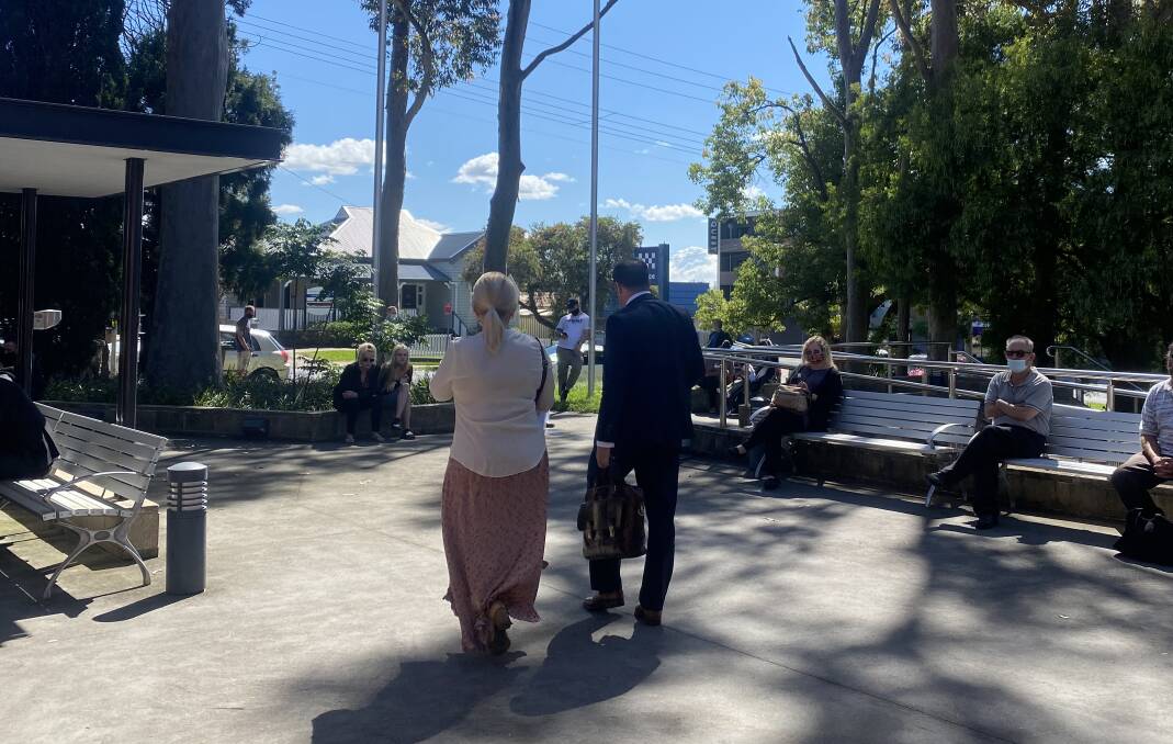 SENTENCED: Deborah Stone and her solicitor leaving Nowra Local Court after being sentenced for dishonestly obtaining financial advantage on Monday, October 25.