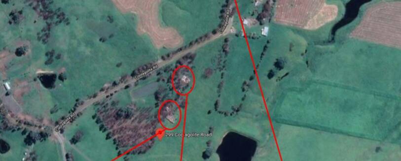 Mr Steele's granny flat (bottom left red circle) and his friend's house (top right red circle) on the Coolagolite Road property. Photo: NSW Coroner's Court