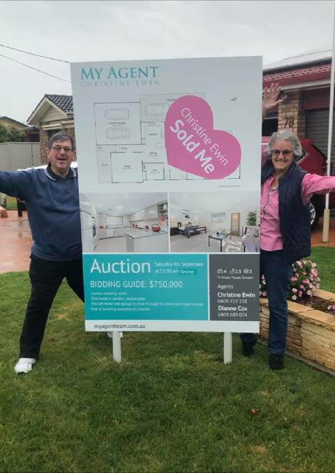 Trish and Gary Chapman celebrate the sale of their home on Ainslie Parade, Tomakin, after an online auction.