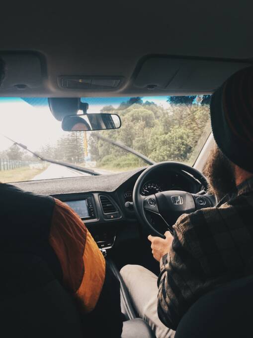 Lachlan Fuzzard and Joel Ryan battle torrential rain, wind and possible-flooding en route to delivering food to the homeless at North Head campground