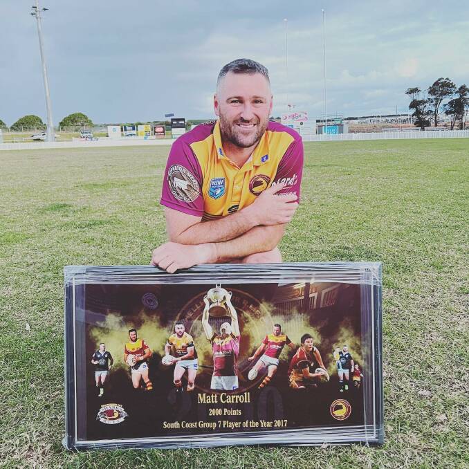 HISTORY MADE. Sharks' skipper Matt Carroll posing with his framed milestone after eclipsing 2000 points. Picture: Shellharbour Sharks RLFC. 