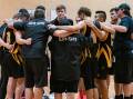 BOUNCE BACK STRONG: The Tigers huddle prior to their opening round win. Picture Shoalhaven Basketball. 