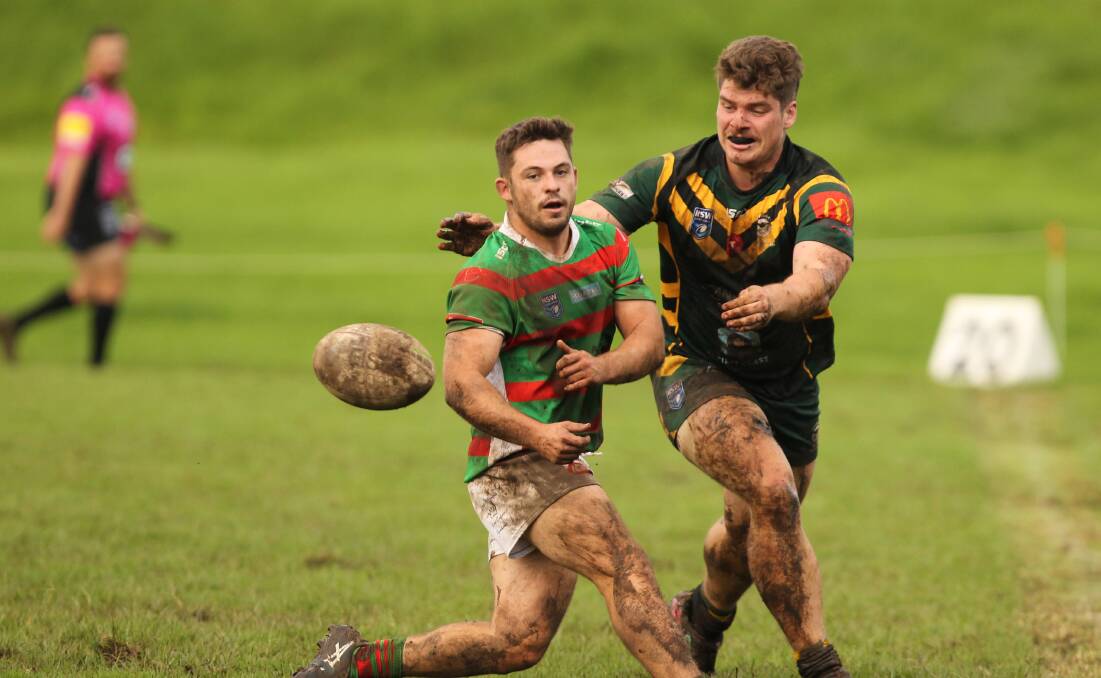 TIMELY VICOTRY: Nuggety Jamberoo hooker Cameron Brabender offloads during a match earlier this season against Stingrays. Brabender was one of the stars of his side's vital win over Warilla on Saturday. Picture: DAVID HALL
