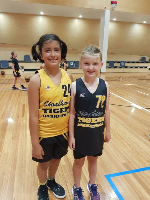 ALL SMILES: Two of the region's young basketball stars. Picture: Amanda Volpatti. 