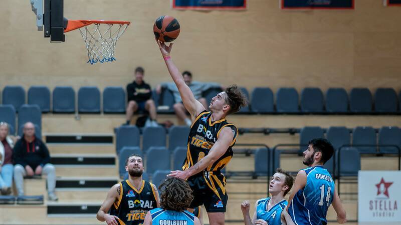 Bryaden Morris attacking the rim last season for the Tigers. Picture by Shoalhaven Basketball Association 