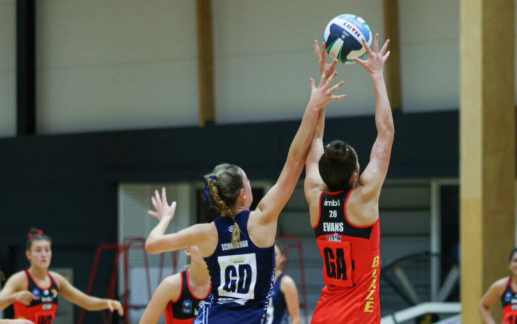 BLAZE TURNING UP THE HEAT: GA Mia Evans fights hard to take a high ball. Picture: Supplied.
