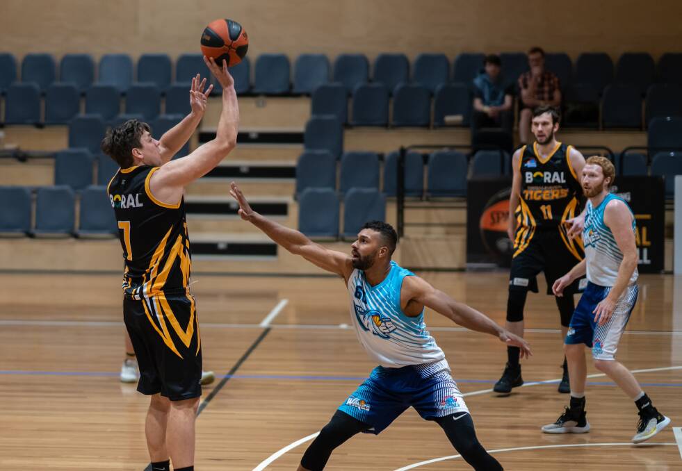 SPLASH CITY: Tigers #7 William Ozolins knocking down one of his three, three pointers in the match. Picture: Shoalhaven Basketball Association. 