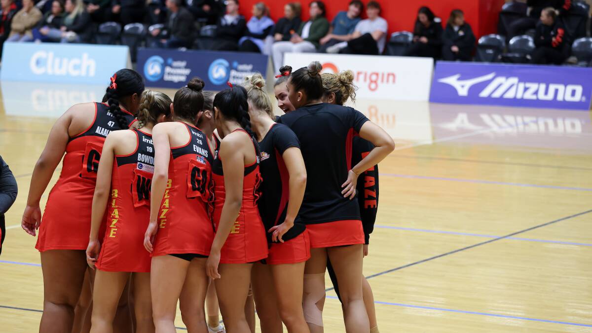 STAGE IS SET: The South Coast Blaze mid-huddle against the Sapphires. Picture: May Bailey | Clusterpix